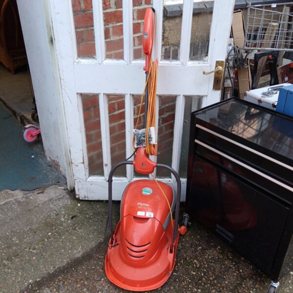 Orange Flymo Mow & Vac electric lawnmower and garden vacuum.
