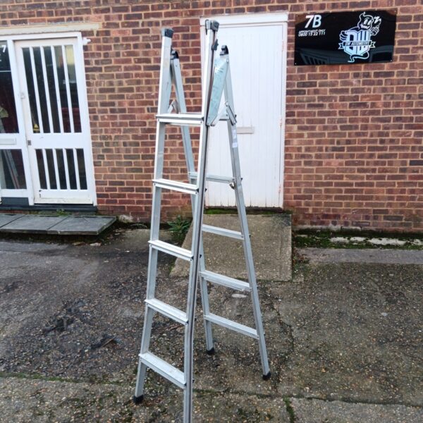 Black & Decker 3 in 1 ladder leaning against a brick wall.