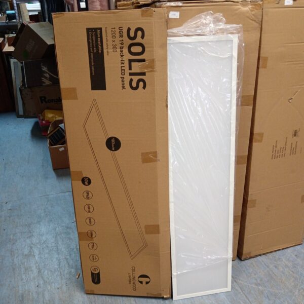 Lot of twelve Solis UGR 19 backlit LED panel lights stacked for auction.