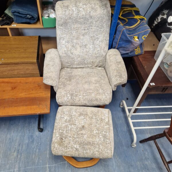 Vintage silver swivel chair with footstool for restoration.