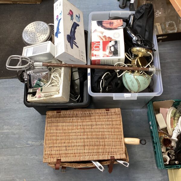 Brass desk lamp within a house clearance lot, vintage style.