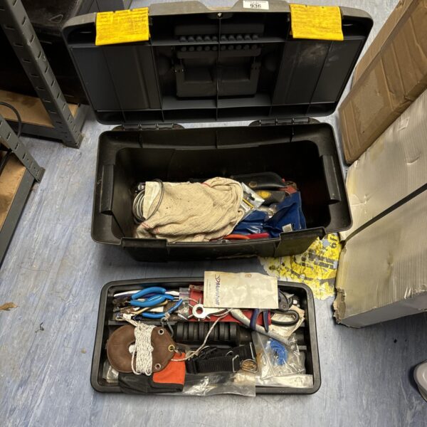 Small Stanley plastic toolbox with various tools inside.