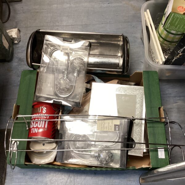 House clearance lot featuring a novelty biscuit tin and kitchen items.