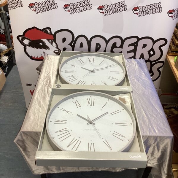 Pair of vintage Churchgate wall clocks for home decor.