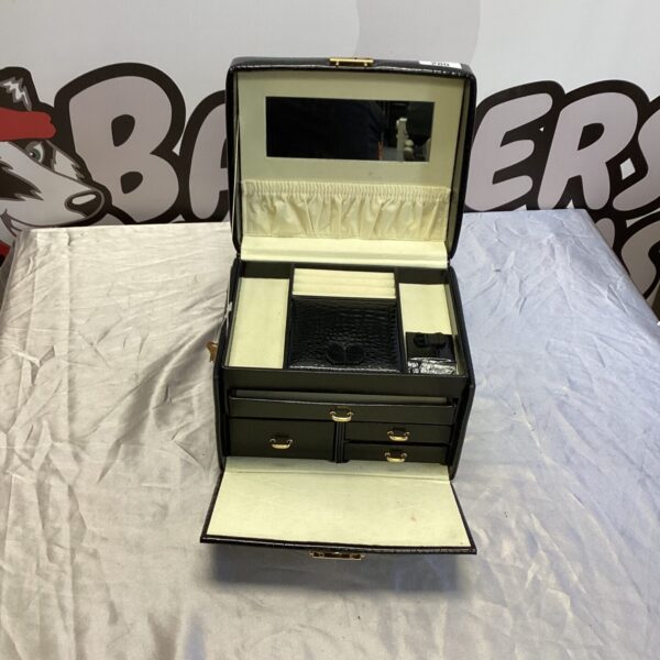 Vintage black leatherette jewellery box with lined interior.