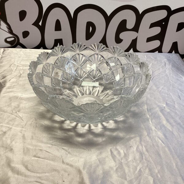 Large crystal fruit bowl with intricate cut-glass design.