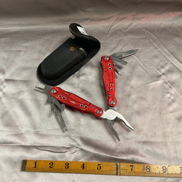 Wilkinson multi tool with black nylon pouch, folding pocket knife.