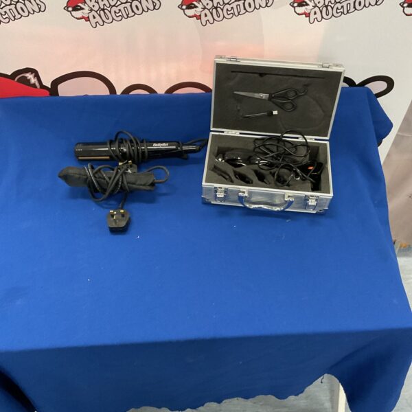 Babyliss hair styling set with clippers, scissors and straighteners.