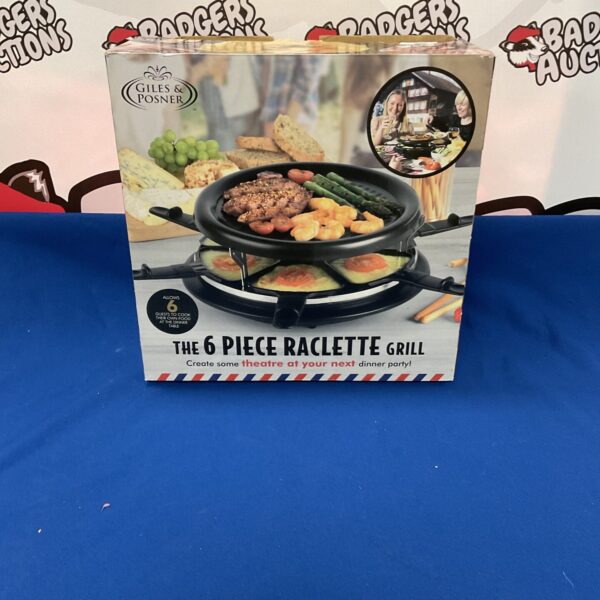 Giles and Posner raclette grill set on a table.