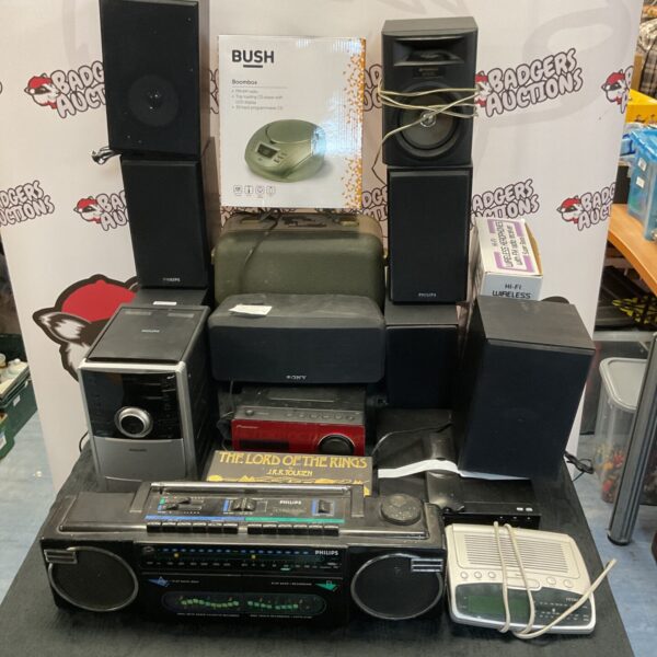 Electrical job lot with radios, DVD player and cassette tapes.