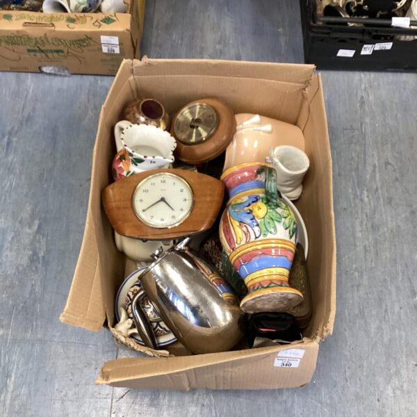 Mixed lot of vintage collectibles including a clock and barometer.
