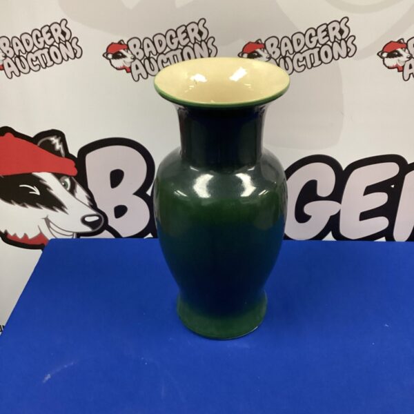 Large green glazed ceramic vase for home decor.