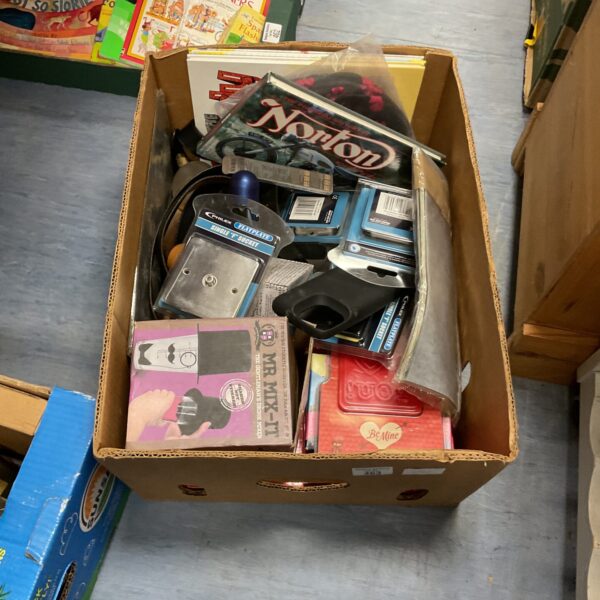 Mixed lot of vintage books, magazines, and electronic components.