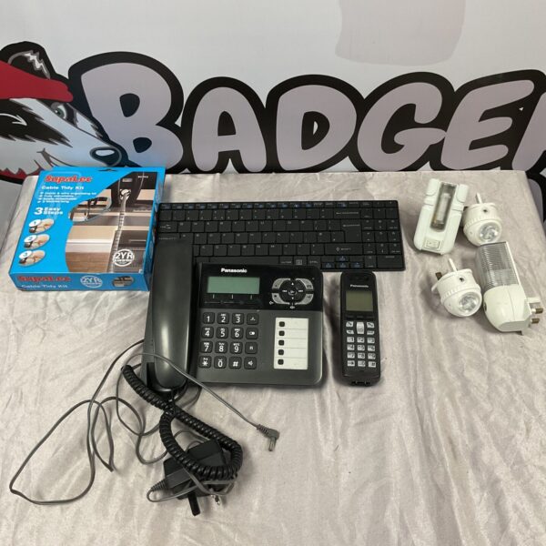 Panasonic phone lot with wireless keyboard and night lights.