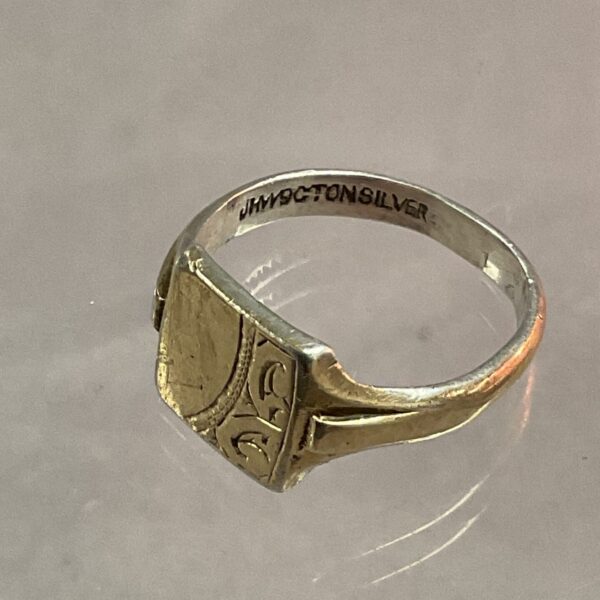 Vintage 9ct gold signet ring on silver band.