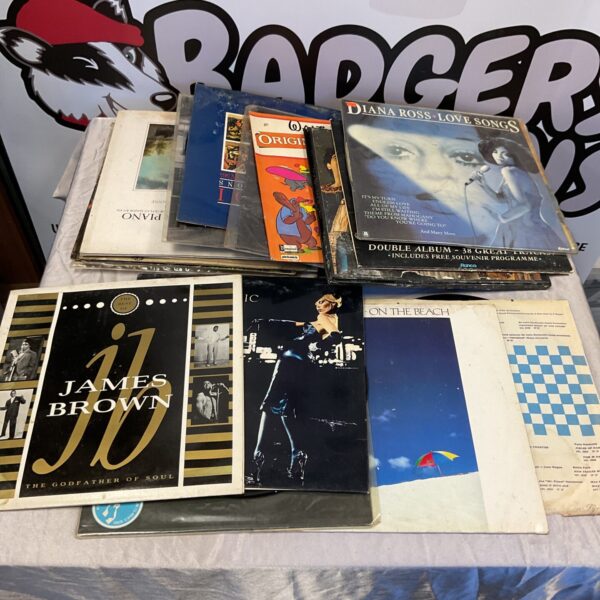Vintage vinyl record collection featuring James Brown and Soul II Soul.