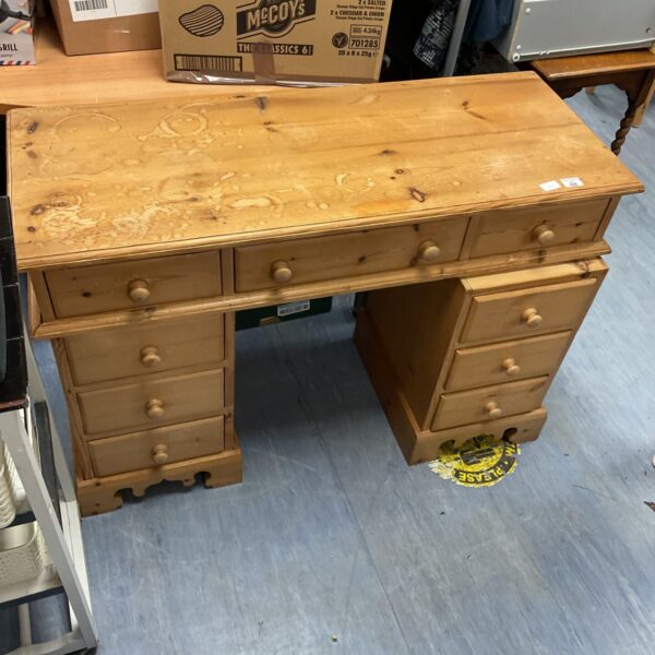 Vintage pine pedestal desk with drawers and cupboards.