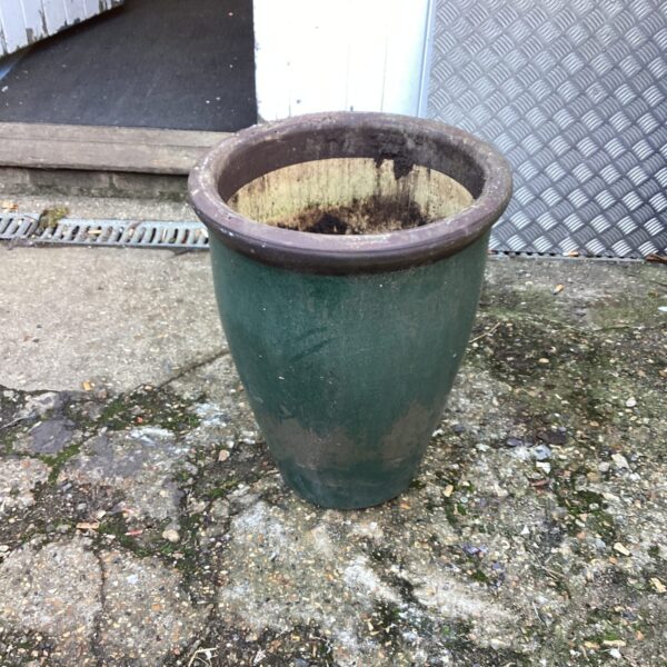 Large terracotta garden planter, weathered and ready for plants.