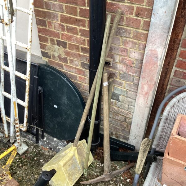 Vintage garden tools lot including hod carrier and digging fork.