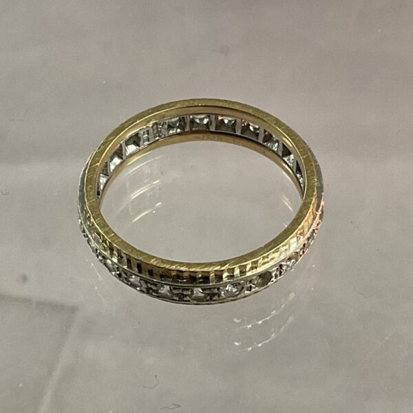 Delicate 9ct gold ring with white stones, size 0.