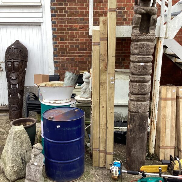 Lot of vintage African carved wooden figures and garden items.