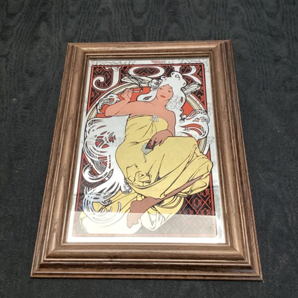 Vintage Art Nouveau mirror in the style of Alphonse Mucha.