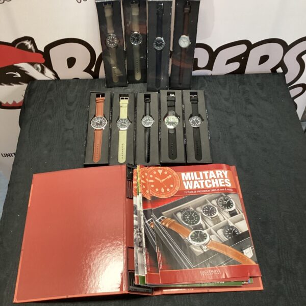 Lot of nine vintage military wrist watches and magazines.