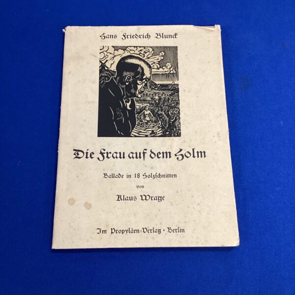 Vintage German book cover with woodblock print illustrations.
