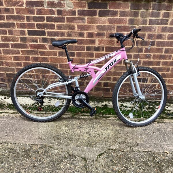 Pink Trax TFS mountain bike with suspension fork.