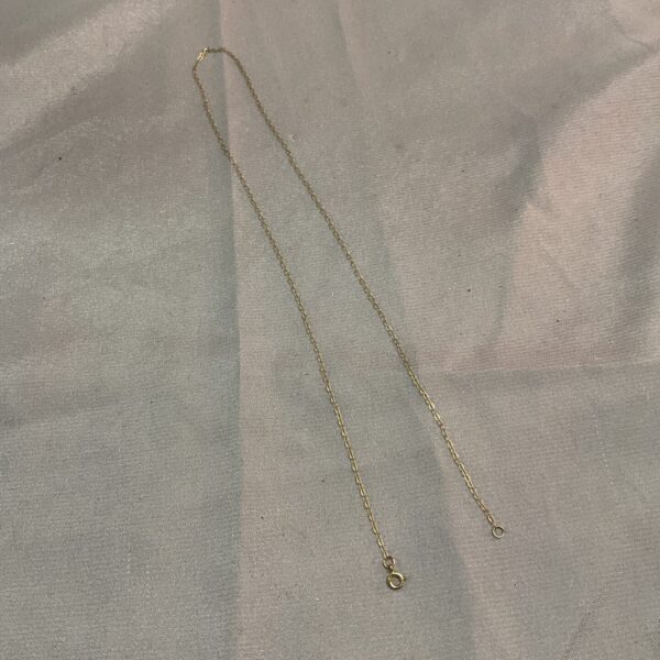 Delicate 9ct gold necklace with a fine chain design.