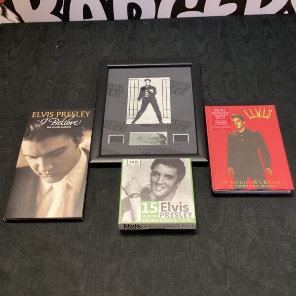 Elvis Presley CD and film cell collection for fans and collectors.