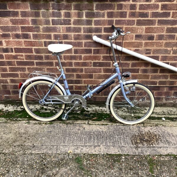 Blue vintage Elite folding bicycle in good condition.