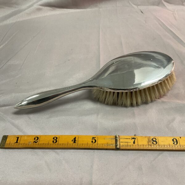 Antique sterling silver hair brush with hallmarked silver.