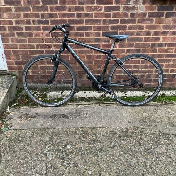 Black mountain bike, Town Cube model, for outdoor activities.