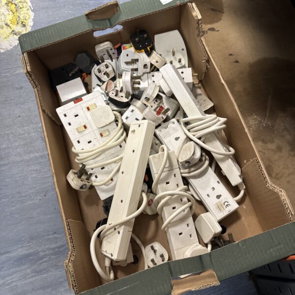 A box filled with various plug and socket extensions.