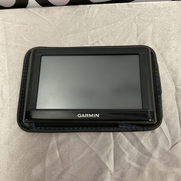 Garmin sat nav with material cover, portable GPS navigation device.