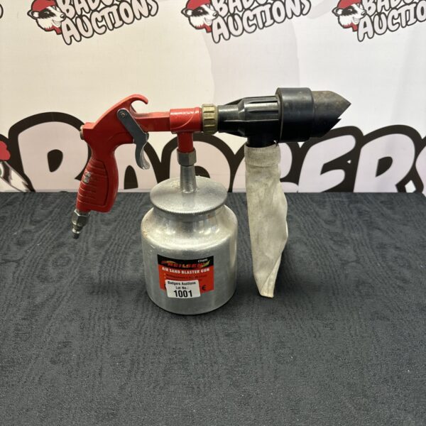 Nielsen air sand blaster gun for abrasive blasting and surface preparation.