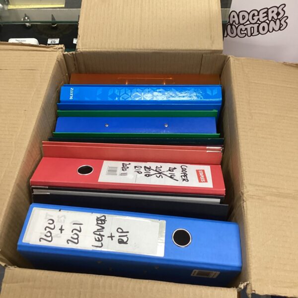 Assorted colourful A4 files for document storage and organisation.