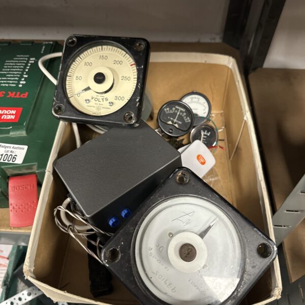 Vintage gauge collection with circular dials and needle indicators.