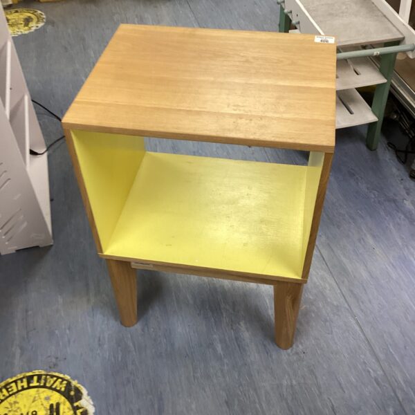 Modern cube bedside table with a single drawer.