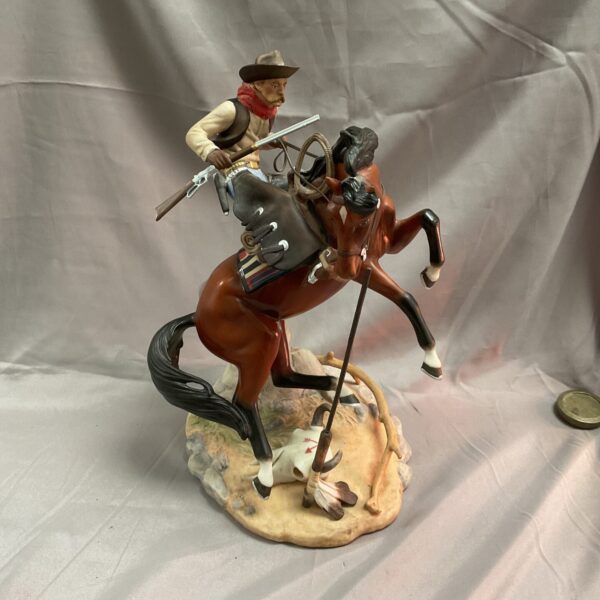 Franklin Mint Sudden Warning sculpture featuring cowboy on horseback.