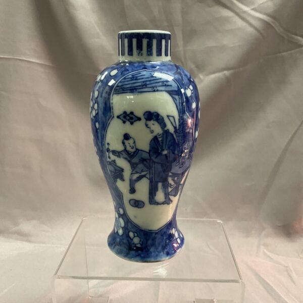 Antique Chinese blue and white porcelain vase with figures.