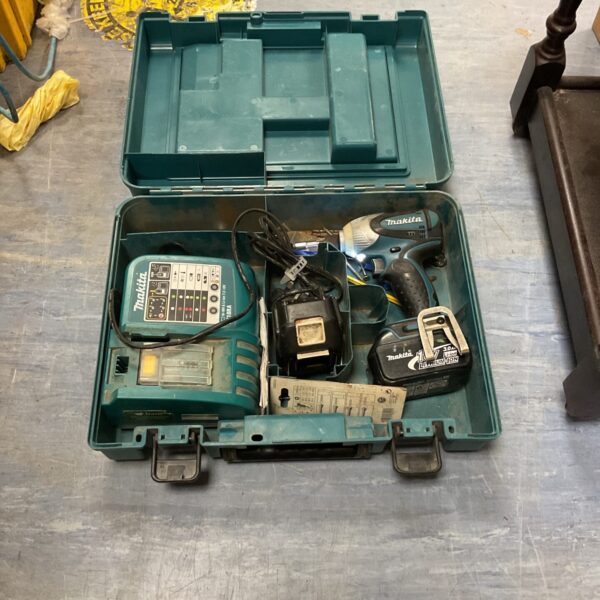 Makita 18v cordless impact driver in open carry case.