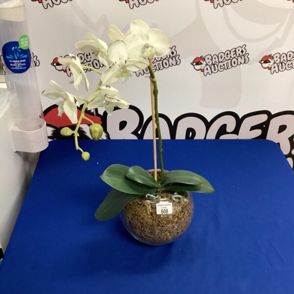 White artificial orchid for home decor and floral arrangements.