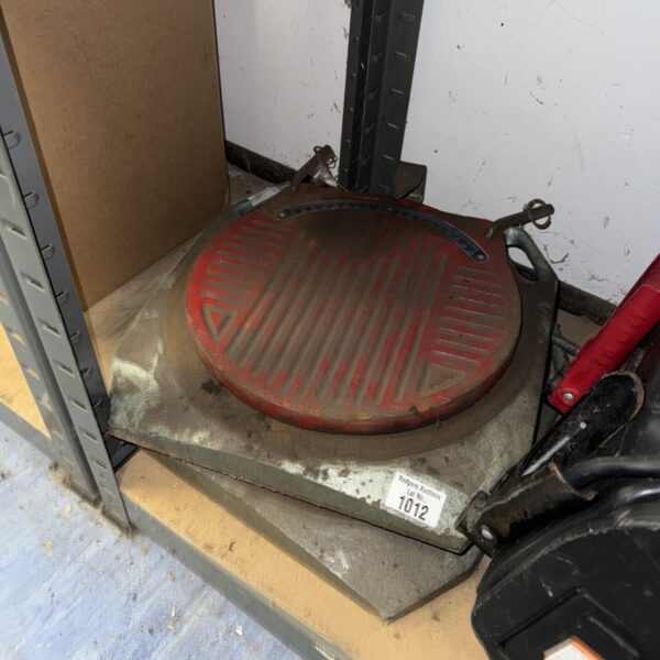 Heavy-duty mechanics bay skid plate for vehicle lifts.