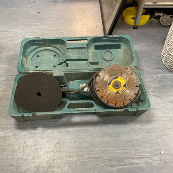 Vintage Makita 230mm angle grinder in its original carrying case.