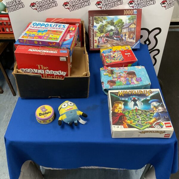 Mixed toy lot with Lego Minotaurus, puzzles and board games.