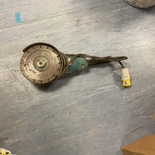 Used Makita 110v angle grinder for metalworking and DIY projects.
