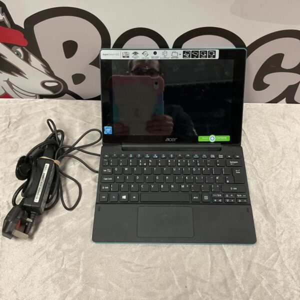 Used Acer laptop computer in grey, ideal for collectors.