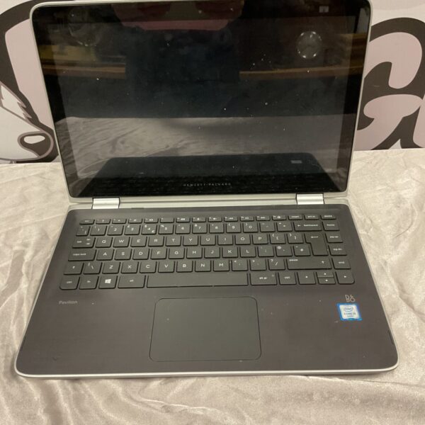 Used HP Pavilion laptop in silver, showing the keyboard and screen.